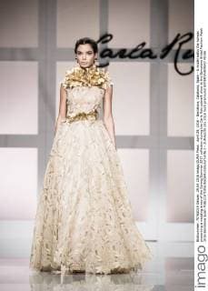 April 29, 2016 - Barcelona, Catalonia, Spain - A model walks the runway presenting a wedding dress of the Spring Summer 2017 collection during the Carla Ruiz catwalk show at the Barcelona Bridal Fashion Week 2016 Barcelona Spain - ZUMAo105