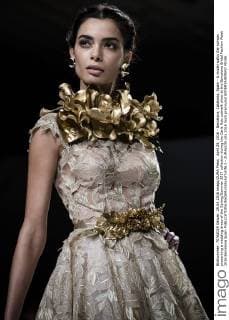 April 29, 2016 - Barcelona, Catalonia, Spain - A model walks the runway presenting a wedding dress of the Spring Summer 2017 collection during the Carla Ruiz catwalk show at the Barcelona Bridal Fashion Week 2016 Barcelona Spain - ZUMAo105