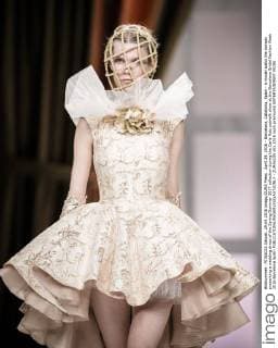 April 29, 2016 - Barcelona, Catalonia, Spain - A model walks the runway presenting a wedding dress of the Spring Summer 2017 collection during the Carla Ruiz catwalk show at the Barcelona Bridal Fashion Week 2016 Barcelona Spain - ZUMAo105
