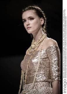 April 29, 2016 - Barcelona, Catalonia, Spain - A model walks the runway presenting a wedding dress of the Spring Summer 2017 collection during the Carla Ruiz catwalk show at the Barcelona Bridal Fashion Week 2016 Barcelona Spain - ZUMAo105