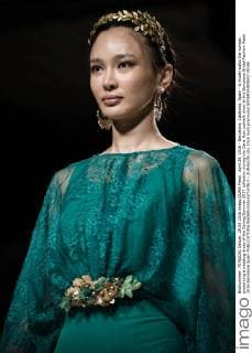 April 29, 2016 - Barcelona, Catalonia, Spain - A model walks the runway presenting a wedding dress of the Spring Summer 2017 collection during the Carla Ruiz catwalk show at the Barcelona Bridal Fashion Week 2016 Barcelona Spain - ZUMAo105