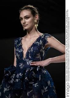 April 29, 2016 - Barcelona, Catalonia, Spain - A model walks the runway presenting a wedding dress of the Spring Summer 2017 collection during the Carla Ruiz catwalk show at the Barcelona Bridal Fashion Week 2016 Barcelona Spain - ZUMAo105