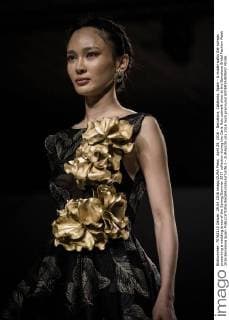 April 29, 2016 - Barcelona, Catalonia, Spain - A model walks the runway presenting a wedding dress of the Spring Summer 2017 collection during the Carla Ruiz catwalk show at the Barcelona Bridal Fashion Week 2016 Barcelona Spain - ZUMAo105