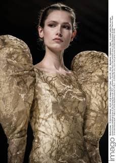 April 29, 2016 - Barcelona, Catalonia, Spain - A model walks the runway presenting a wedding dress of the Spring Summer 2017 collection during the Carla Ruiz catwalk show at the Barcelona Bridal Fashion Week 2016 Barcelona Spain - ZUMAo105
