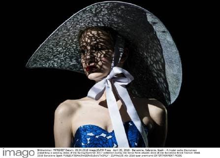 April 29, 2016 - Barcelona, Catalonia, Spain - A model walks the runway presenting a wedding dress of the Spring Summer 2017 collection during the Sonia Pena catwalk show at the Barcelona Bridal Fashion Week 2016 Barcelona Spain - ZUMAo105