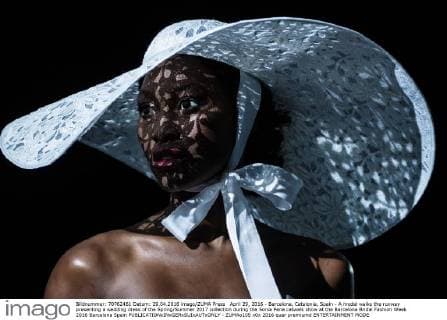 April 29, 2016 - Barcelona, Catalonia, Spain - A model walks the runway presenting a wedding dress of the Spring Summer 2017 collection during the Sonia Pena catwalk show at the Barcelona Bridal Fashion Week 2016 Barcelona Spain - ZUMAo105