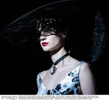 April 29, 2016 - Barcelona, Catalonia, Spain - A model walks the runway presenting a wedding dress of the Spring Summer 2017 collection during the Sonia Pena catwalk show at the Barcelona Bridal Fashion Week 2016 Barcelona Spain - ZUMAo105