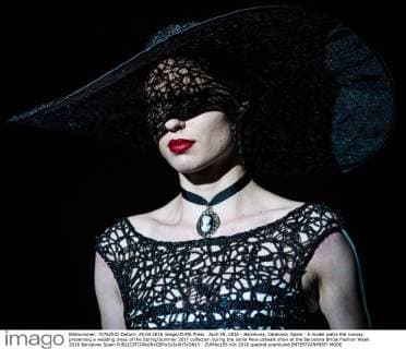April 29, 2016 - Barcelona, Catalonia, Spain - A model walks the runway presenting a wedding dress of the Spring Summer 2017 collection during the Sonia Pena catwalk show at the Barcelona Bridal Fashion Week 2016 Barcelona Spain - ZUMAo105