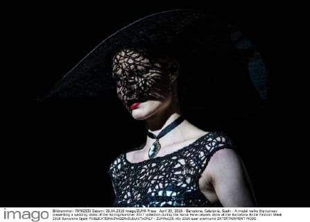 April 29, 2016 - Barcelona, Catalonia, Spain - A model walks the runway presenting a wedding dress of the Spring Summer 2017 collection during the Sonia Pena catwalk show at the Barcelona Bridal Fashion Week 2016 Barcelona Spain - ZUMAo105