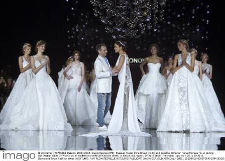 Russian model Irina Shayk (C-R) and Creative Director Herve Moreau (C-L) during the fashion show by Pronovias in the Barcelona Bridal Fashion Week, in Barcelona, Spain, 29 April 2016. The event runs from 26 to 29 April. Barcelona Bridal Fashion Week !ACHTUNG: NUR REDAKTIONELLE NUTZUNG!  BRI01 20160429-635975649170418305