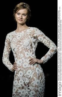 April 29, 2016 - Barcelona, Catalonia, Spain - A model walks the runway presenting a wedding dress of the Spring Summer 2017 collection during the Pronovias catwalk show at the Barcelona Bridal Fashion Week 2016 Barcelona Spain - ZUMAo105