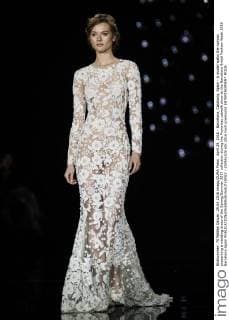 April 29, 2016 - Barcelona, Catalonia, Spain - A model walks the runway presenting a wedding dress of the Spring Summer 2017 collection during the Pronovias catwalk show at the Barcelona Bridal Fashion Week 2016 Barcelona Spain - ZUMAo105