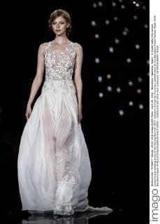 April 29, 2016 - Barcelona, Catalonia, Spain - A model walks the runway presenting a wedding dress of the Spring Summer 2017 collection during the Pronovias catwalk show at the Barcelona Bridal Fashion Week 2016 Barcelona Spain - ZUMAo105