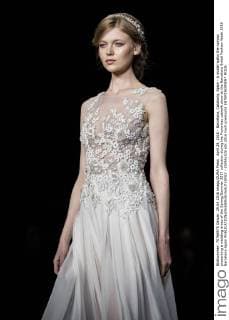 April 29, 2016 - Barcelona, Catalonia, Spain - A model walks the runway presenting a wedding dress of the Spring Summer 2017 collection during the Pronovias catwalk show at the Barcelona Bridal Fashion Week 2016 Barcelona Spain - ZUMAo105