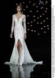 April 29, 2016 - Barcelona, Catalonia, Spain - A model walks the runway presenting a wedding dress of the Spring Summer 2017 collection during the Pronovias catwalk show at the Barcelona Bridal Fashion Week 2016 Barcelona Spain - ZUMAo105