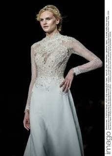 April 29, 2016 - Barcelona, Catalonia, Spain - A model walks the runway presenting a wedding dress of the Spring Summer 2017 collection during the Pronovias catwalk show at the Barcelona Bridal Fashion Week 2016 Barcelona Spain - ZUMAo105