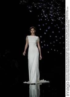 April 29, 2016 - Barcelona, Catalonia, Spain - A model walks the runway presenting a wedding dress of the Spring Summer 2017 collection during the Pronovias catwalk show at the Barcelona Bridal Fashion Week 2016 Barcelona Spain - ZUMAo105