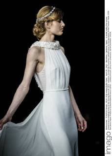 April 29, 2016 - Barcelona, Catalonia, Spain - A model walks the runway presenting a wedding dress of the Spring Summer 2017 collection during the Pronovias catwalk show at the Barcelona Bridal Fashion Week 2016 Barcelona Spain - ZUMAo105