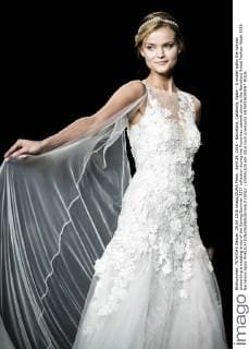 April 29, 2016 - Barcelona, Catalonia, Spain - A model walks the runway presenting a wedding dress of the Spring Summer 2017 collection during the Pronovias catwalk show at the Barcelona Bridal Fashion Week 2016 Barcelona Spain - ZUMAo105