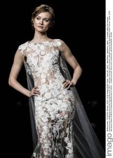 April 29, 2016 - Barcelona, Catalonia, Spain - A model walks the runway presenting a wedding dress of the Spring Summer 2017 collection during the Pronovias catwalk show at the Barcelona Bridal Fashion Week 2016 Barcelona Spain - ZUMAo105