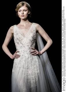 April 29, 2016 - Barcelona, Catalonia, Spain - A model walks the runway presenting a wedding dress of the Spring Summer 2017 collection during the Pronovias catwalk show at the Barcelona Bridal Fashion Week 2016 Barcelona Spain - ZUMAo105