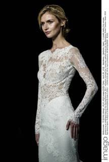 April 29, 2016 - Barcelona, Catalonia, Spain - A model walks the runway presenting a wedding dress of the Spring Summer 2017 collection during the Pronovias catwalk show at the Barcelona Bridal Fashion Week 2016 Barcelona Spain - ZUMAo105