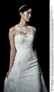 April 29, 2016 - Barcelona, Catalonia, Spain - A model walks the runway presenting a wedding dress of the Spring Summer 2017 collection during the Pronovias catwalk show at the Barcelona Bridal Fashion Week 2016 Barcelona Spain - ZUMAo105