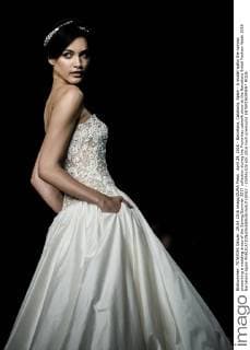 April 29, 2016 - Barcelona, Catalonia, Spain - A model walks the runway presenting a wedding dress of the Spring Summer 2017 collection during the Pronovias catwalk show at the Barcelona Bridal Fashion Week 2016 Barcelona Spain - ZUMAo105