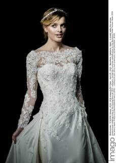 April 29, 2016 - Barcelona, Catalonia, Spain - A model walks the runway presenting a wedding dress of the Spring Summer 2017 collection during the Pronovias catwalk show at the Barcelona Bridal Fashion Week 2016 Barcelona Spain - ZUMAo105