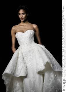 April 29, 2016 - Barcelona, Catalonia, Spain - A model walks the runway presenting a wedding dress of the Spring Summer 2017 collection during the Pronovias catwalk show at the Barcelona Bridal Fashion Week 2016 Barcelona Spain - ZUMAo105