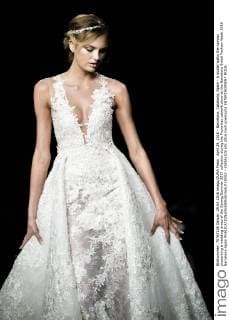 April 29, 2016 - Barcelona, Catalonia, Spain - A model walks the runway presenting a wedding dress of the Spring Summer 2017 collection during the Pronovias catwalk show at the Barcelona Bridal Fashion Week 2016 Barcelona Spain - ZUMAo105