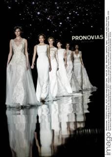 April 29, 2016 - Barcelona, Catalonia, Spain - A model walks the runway presenting a wedding dress of the Spring Summer 2017 collection during the Pronovias catwalk show at the Barcelona Bridal Fashion Week 2016 Barcelona Spain - ZUMAo105