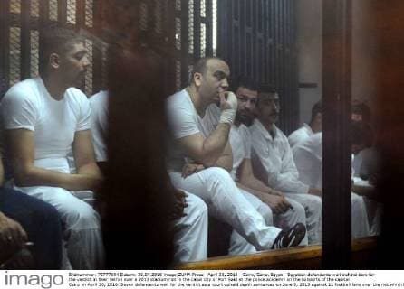 April 30, 2016 - Cairo, Cairo, Egypt - Egyptian defendants wait behind bars for the verdict in their retrial over a 2012 stadium riot in the canal city of Port Said at the police academy on the outskirts of the capital Cairo on April 30, 2016. Seven defendants wait for the verdict as a court upheld death sentences on June 9, 2015 against 11 football fans over the riot which broke out when fans of home team Al-Masry and Cairo s Al-Ahly clashed after a premier league match between the two clubs, leaving 74 people dead on May 30, 2015 Cairo Egypt - ZUMAap3_