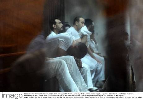 April 30, 2016 - Cairo, Cairo, Egypt - Egyptian defendants wait behind bars for the verdict in their retrial over a 2012 stadium riot in the canal city of Port Said at the police academy on the outskirts of the capital Cairo on April 30, 2016. Seven defendants wait for the verdict as a court upheld death sentences on June 9, 2015 against 11 football fans over the riot which broke out when fans of home team Al-Masry and Cairo s Al-Ahly clashed after a premier league match between the two clubs, leaving 74 people dead on May 30, 2015 Cairo Egypt - ZUMAap3_