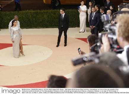 MET Gala 2016 Kanye West and Kim Kardashian arrive on the red carpet at the Costume Institute Benefit at The Metropolitan Museum of Art celebrating the opening of Manus x Machina: Fashion in an Age of Technology in New York City on May 2, 2016.  NYP20160502113 JOHNxANGELILLO