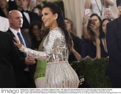 MET Gala 2016 Kim Kardashian arrive on the red carpet at the Costume Institute Benefit at The Metropolitan Museum of Art celebrating the opening of Manus x Machina: Fashion in an Age of Technology in New York City on May 2, 2016.  NYP20160502134 JOHNxANGELILLO