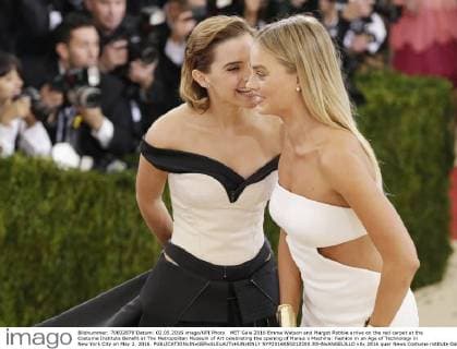 MET Gala 2016 Emma Watson and Margot Robbie arrive on the red carpet at the Costume Institute Benefit at The Metropolitan Museum of Art celebrating the opening of Manus x Machina: Fashion in an Age of Technology in New York City on May 2, 2016.  NYP2016050212200 JOHNxANGELILLO