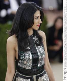 MET Gala 2016 Huma Abedin arrives on the red carpet at the Costume Institute Benefit at The Metropolitan Museum of Art celebrating the opening of Manus x Machina: Fashion in an Age of Technology in New York City on May 2, 2016.  NYP2016050212165 JOHNxANGELILLO