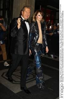 May 2, 2016 - New York, New York, U.S. - Photographer MARIO TESTINO and model EDIE CAMPBELL exit the Mark Hotel, to attend the 2016 Costume Institute MET GALA entitled Manus x Machina: Fashion in the Age of Technology. New York U.S. - ZUMAk03_