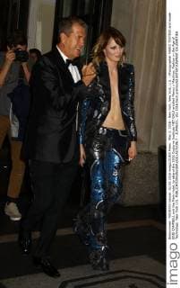 May 2, 2016 - New York, New York, U.S. - Photographer MARIO TESTINO and model EDIE CAMPBELL exit the Mark Hotel, to attend the 2016 Costume Institute MET GALA entitled Manus x Machina: Fashion in the Age of Technology. New York U.S. - ZUMAk03_