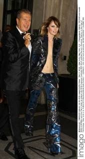 May 2, 2016 - New York, New York, U.S. - Photographer MARIO TESTINO and model EDIE CAMPBELL exit the Mark Hotel, to attend the 2016 Costume Institute MET GALA entitled Manus x Machina: Fashion in the Age of Technology. New York U.S. - ZUMAk03_