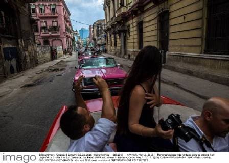 (160504) -- HAVANA, May 3, 2016 -- Honored guests ride vintage cars to attend Karl Lagerfeld s Cruise line for Chanel at the Paseo del Prado street in Havana, Cuba, May 3, 2016. )(dh) CUBA-HAVANA-FASHION-CHANEL LiuxBin 