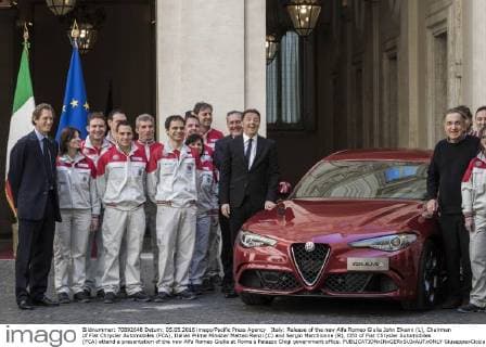 Italy: Release of the new Alfa Romeo Giulia John Elkann (L), Chairman of Fiat Chrysler Automobiles (FCA), Italian Prime Minister Matteo Renzi (C) and Sergio Marchionne (R), CEO of Fiat Chrysler Automobiles (FCA) attend a presentation of the new Alfa Romeo Giulia at Rome s Palazzo Chigi government office.  GiuseppexCiccia