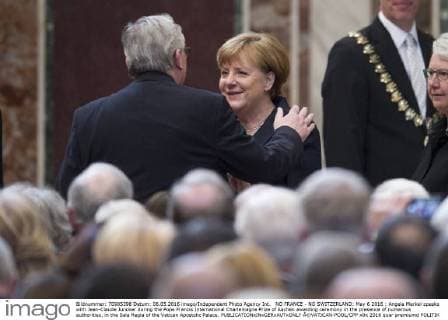 NO FRANCE - NO SWITZERLAND: May 6 2016 : Angela Merkel speaks with Jean-Claude Juncker during the Pope Francis International Charlemagne Prize of Aachen awarding ceremony in the presence of numerous authorities, in the Sala Regia of the Vatican Apostolic Palace.  Â©VATICAN-POOL CPP
