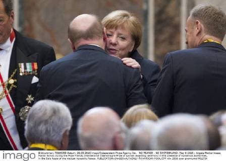 NO FRANCE - NO SWITZERLAND: May 6 2016 : Angela Merkel kisses Martin Schulz during the Pope Francis International Charlemagne Prize of Aachen awarding ceremony in the presence of numerous authorities, in the Sala Regia of the Vatican Apostolic Palace.  Â©VATICAN-POOL CPP