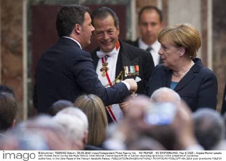 NO FRANCE - NO SWITZERLAND: May 6 2016 : Angela Merkel speaks with Matteo Renzi during the Pope Francis International Charlemagne Prize of Aachen awarding ceremony in the presence of numerous authorities, in the Sala Regia of the Vatican Apostolic Palace.  Â©VATICAN-POOL CPP