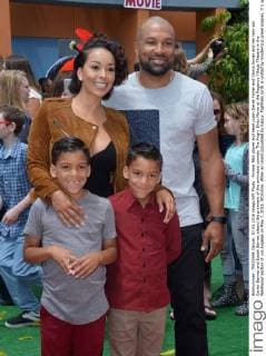 Former NBA player and head coach Derek Fisher and Gloria Govan and her twin son Carter Barnes and Isaiah Barnes attend the premiere of the animated comedy The Angry Birds Movie at the Regency Village Theatre in the Westwood section of Los Angeles on May 7, 2016. Storyline: When an island populated by happy, flightless birds is visited by mysterious green piggies, it s up to three unlikely outcasts - Red, Chuck and Bomb - to figure out what the pigs are up to.  LAP2016050720 JIMxRUYMEN