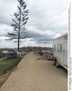 May 9, 2016 - Canada - Na-wildfire-demolition9..About 80 per cent of Fort McMurray s Beacon Hill neighbourhood was lost to the fire. CREDIT Canada  - ZUMAt14_