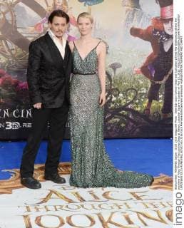 American actor Johnny Depp and Australian actress Mia Wasikowska attend the premiere of Alice Through The Looking Glass at Odeon, Leicester Square in London on May 10, 2016.  LON20160510115 RUNExHELLESTAD