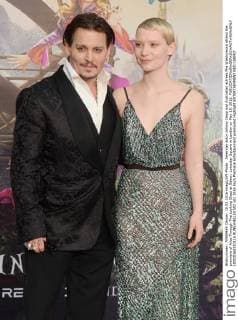 American actor Johnny Depp and Australian actress Mia Wasikowska attend the premiere of Alice Through The Looking Glass at Odeon, Leicester Square in London on May 10, 2016.  LON20160510116 RUNExHELLESTAD